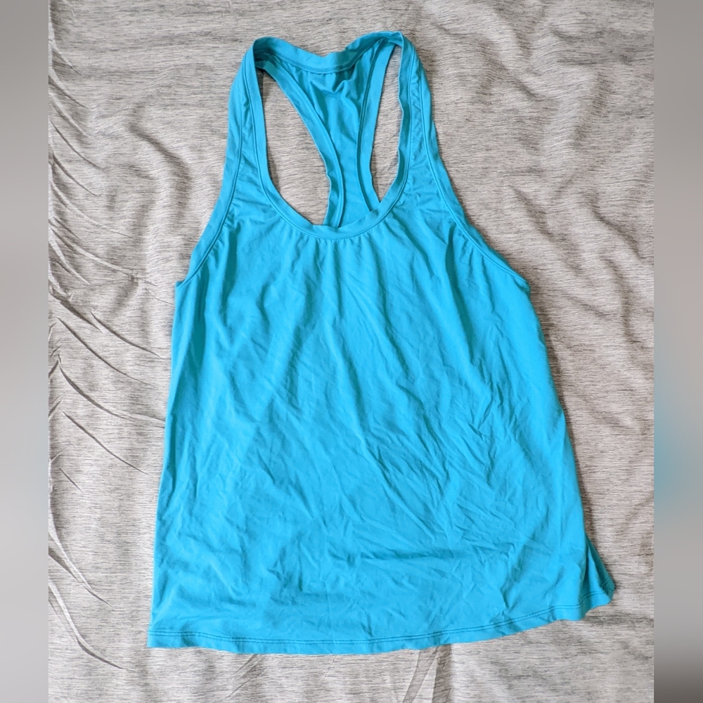 Alo Yoga racetrack tank top. Size Small. Color light/ bright blue